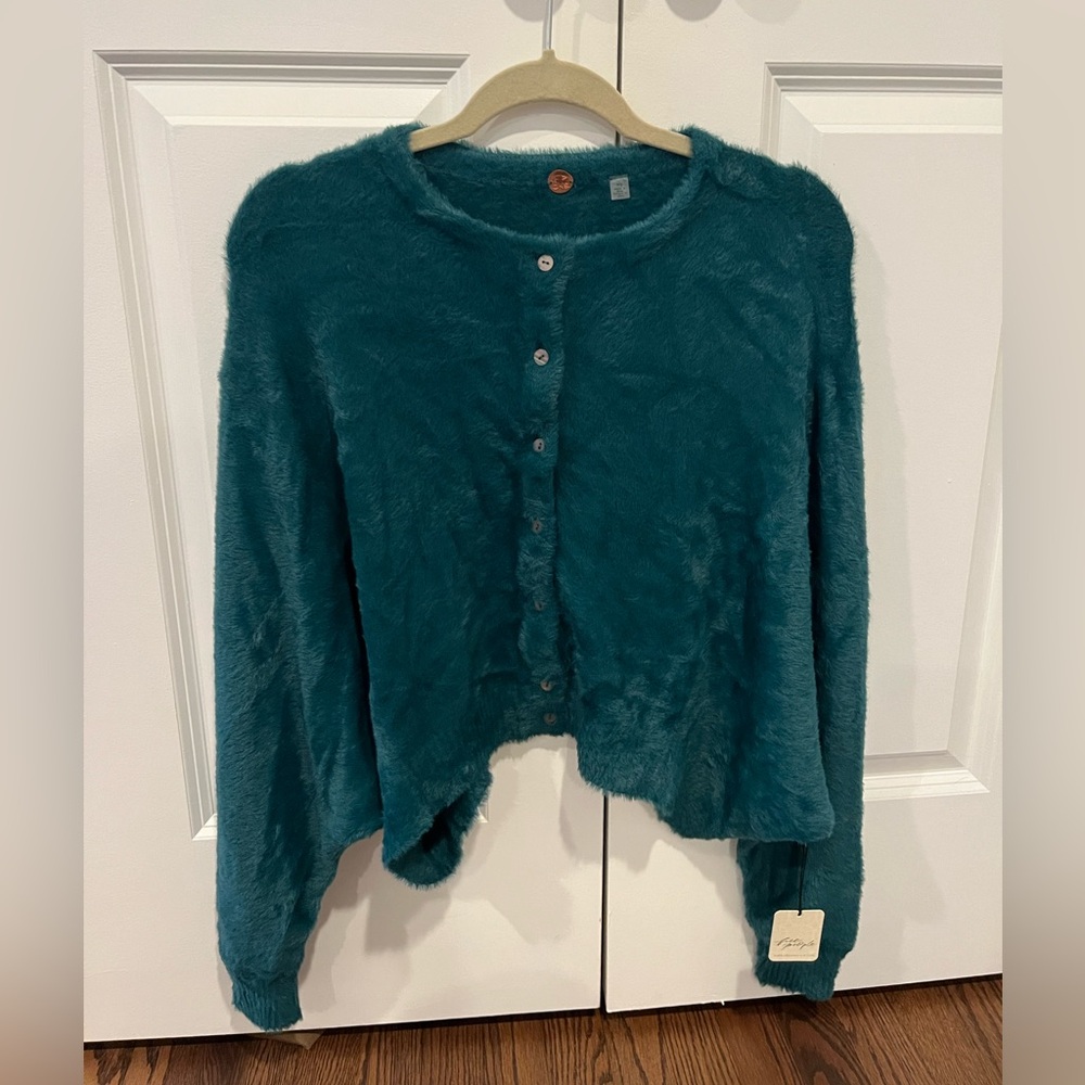 Gorgeous color!  Free People cardigan 100% Nylon
